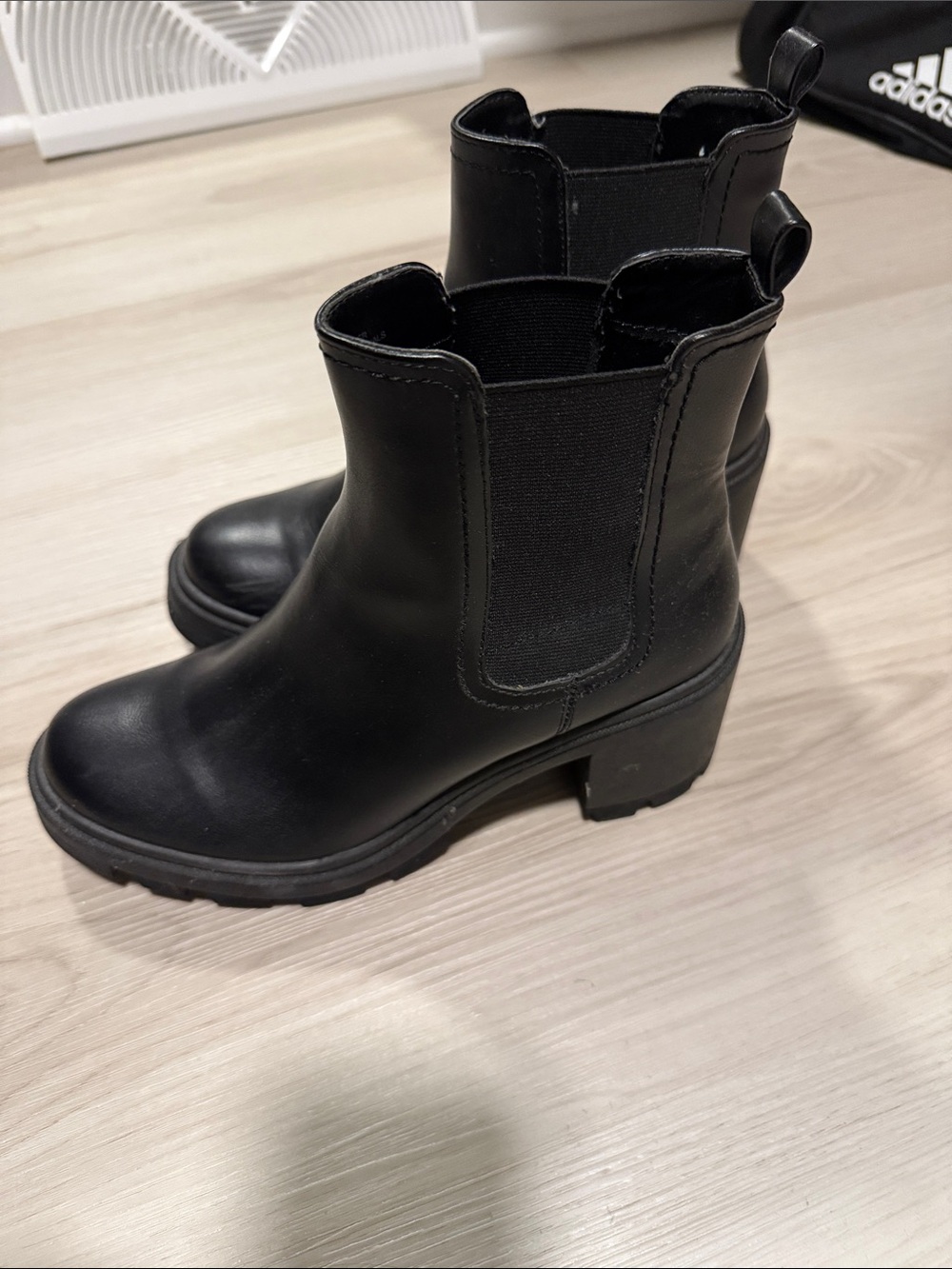 Woman’s wedge black boots size 8